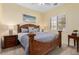 Bedroom with a large bed, natural light, and a ceiling fan provides a relaxing retreat at 16540 E El Lago Blvd # 2, Fountain Hills, AZ 85268