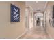 Hallway features marble flooring, neutral paint, and decorative artwork at 16540 E El Lago Blvd # 2, Fountain Hills, AZ 85268