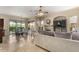Spacious living room area with fireplace, dining area and access to the patio at 16540 E El Lago Blvd # 2, Fountain Hills, AZ 85268