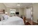 A main bedroom featuring a plush bed and views into the sitting room and bathroom at 16540 E El Lago Blvd # 2, Fountain Hills, AZ 85268