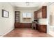 Well-lit office with built-in cabinetry, desk space, and a view of the garage at 16540 E El Lago Blvd # 2, Fountain Hills, AZ 85268