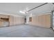 Spacious garage with built-in cabinets and ample storage at 17429 W Red Bird Rd, Surprise, AZ 85387