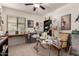 Bright studio space with built-in desk and natural light, perfect for creative projects and hobbies at 18415 W Surprise Farms N Loop, Surprise, AZ 85388