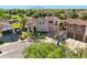 Aerial view of a charming two-story home with a well-manicured lawn and inviting curb appeal at 2111 E Azalea Dr, Chandler, AZ 85286