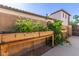 Backyard features raised garden beds, offering an opportunity for gardening and outdoor enjoyment at 2111 E Azalea Dr, Chandler, AZ 85286