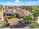 Aerial view of the property showing a patio, private yard and other neighborhood homes at 2111 E Azalea Dr, Chandler, AZ 85286