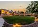 Expansive backyard featuring a well-maintained lawn, outdoor living area, and mature trees, ideal for recreation at 2111 E Azalea Dr, Chandler, AZ 85286