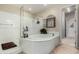 Relaxing bathroom with soaking tub, a separate shower, and elegant decor at 2111 E Azalea Dr, Chandler, AZ 85286