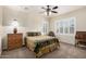 Comfortable bedroom with large windows, carpet floors, and neutral color palette at 2111 E Azalea Dr, Chandler, AZ 85286