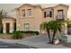 A well-lit home exterior with a traditional design and lush landscaping at 2111 E Azalea Dr, Chandler, AZ 85286
