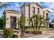 An impressive home exterior showcasing well-manicured landscaping and a private courtyard at 2111 E Azalea Dr, Chandler, AZ 85286