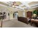 Spacious living room with coffered ceilings, arched doorways, and elegant furniture at 2111 E Azalea Dr, Chandler, AZ 85286