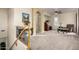 Upstairs loft with desk and chair with stair access to the lower level at 2111 E Azalea Dr, Chandler, AZ 85286