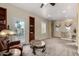 Upstairs loft with bookshelves, seating area and an exit to the outside at 2111 E Azalea Dr, Chandler, AZ 85286