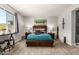 The main bedroom is bright and airy, with a neutral color scheme, and carpet floors at 22495 E Silver Creek Ln, Queen Creek, AZ 85142