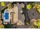 Aerial view of the backyard pool and landscaping and front driveway at 22610 N 80Th Pl, Scottsdale, AZ 85255