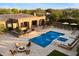 Aerial view of the backyard pool, spa, and outdoor entertaining area at 22610 N 80Th Pl, Scottsdale, AZ 85255