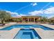 Stunning backyard with a large pool, spa, water feature, and ample space for relaxing and entertaining guests at 22610 N 80Th Pl, Scottsdale, AZ 85255
