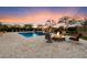 Backyard oasis with a pool, spa, and fire pit area, perfect for entertaining and relaxation at 22610 N 80Th Pl, Scottsdale, AZ 85255