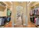 Spacious walk-in closet with ample storage and organization, offering convenience and style for wardrobe management at 22610 N 80Th Pl, Scottsdale, AZ 85255