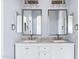 Bathroom vanity with double sinks, granite countertop, and storage beneath at 2272 W Jasper Butte Dr, Queen Creek, AZ 85144