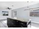 Open floor plan featuring a large kitchen island with granite countertops at 2272 W Jasper Butte Dr, Queen Creek, AZ 85144