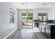 Bright kitchen with stainless steel appliances and a view of the backyard at 2272 W Jasper Butte Dr, Queen Creek, AZ 85144