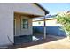 View of the backyard with a covered patio and a rock area at 2745 W Jessica Ln, Phoenix, AZ 85041