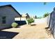 Backyard view shows trees and a view of the neighboring homes at 2745 W Jessica Ln, Phoenix, AZ 85041