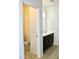 Clean bathroom with toilet and sink/vanity, with tile flooring at 2745 W Jessica Ln, Phoenix, AZ 85041