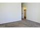 Bright and airy bedroom with plush neutral carpeting and ample closet space at 2745 W Jessica Ln, Phoenix, AZ 85041