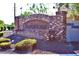 Welcoming brick community sign with the neighborhood name, 