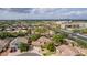 Tile roofed home shows professional landscaping, mature trees, and ample parking at 30 W Sheffield Ave, Gilbert, AZ 85233