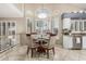 Charming breakfast nook with a round table, four chairs, and bright natural light at 30 W Sheffield Ave, Gilbert, AZ 85233