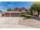 Charming two-story home with a three-car garage and well-maintained landscaping at 30 W Sheffield Ave, Gilbert, AZ 85233