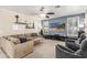 Comfortable living room with plush seating, a ceiling fan, and a mounted television at 30 W Sheffield Ave, Gilbert, AZ 85233