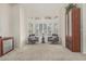 Cozy living room with two armchairs, and a large bay window with plantation shutters at 30 W Sheffield Ave, Gilbert, AZ 85233