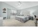Serene bedroom with a plush bed, calming color palette, and great natural light at 30 W Sheffield Ave, Gilbert, AZ 85233