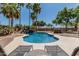 Beautiful pool with a rock waterfall and lush landscaping for a serene backyard oasis at 30 W Sheffield Ave, Gilbert, AZ 85233