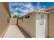 A view of the backyard shed and concrete patio provides extra space at 3035 W Roberta Dr, Phoenix, AZ 85083