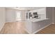 Modern kitchen featuring white cabinets, stainless steel appliances, and a bright breakfast nook at 3035 W Roberta Dr, Phoenix, AZ 85083