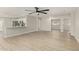 Open-concept living space with a breakfast bar, stainless steel appliances, and modern finishes at 3035 W Roberta Dr, Phoenix, AZ 85083
