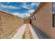 Property view with a block fence, gated access, and desert landscaping at 3035 W Roberta Dr, Phoenix, AZ 85083