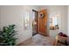 Inviting entryway with decorative door, floral wreath, neutral walls, and plenty of natural light at 3085 E Parkview Dr, Gilbert, AZ 85295