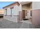 Inviting front porch showcasing a decorative security door, stone accents, and manicured landscaping at 3085 E Parkview Dr, Gilbert, AZ 85295