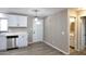 Charming dining area with modern cabinetry, a new sink and faucet, and stylish new lighting at 319 S 90 Pl, Mesa, AZ 85208