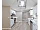 Spacious kitchen featuring stainless steel appliances, quartz counters, and modern cabinetry at 319 S 90 Pl, Mesa, AZ 85208