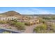 Desert home with circular driveway and native landscaping with mountain views at 3553 N Crystal Peak Cir, Mesa, AZ 85207