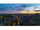 Panoramic city view from a desert home, enhanced by a vibrant sunset backdrop at 3553 N Crystal Peak Cir, Mesa, AZ 85207