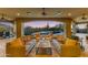 Covered patio overlooking pool with desert sunset views, and comfortable outdoor seating at 3553 N Crystal Peak Cir, Mesa, AZ 85207
